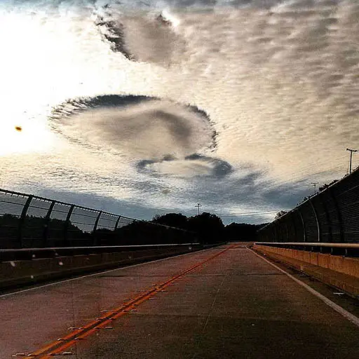 Do Planes Trigger Rains? Fallstreak Holes